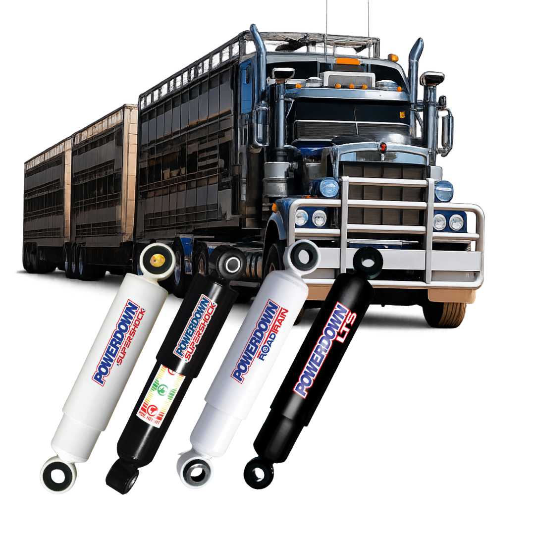 Powerdown shock absorbers for commercial vehicles